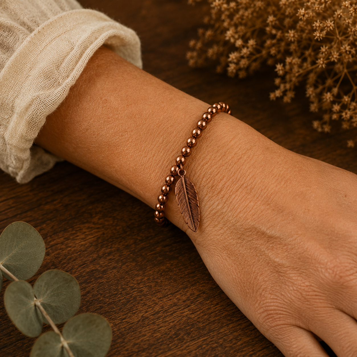 Feather Charm Gold Bracelet