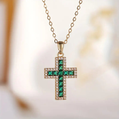 Solene Gold Necklace with Cross Pendant and Emerald
