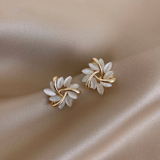 Circle earrings with gold opal petals