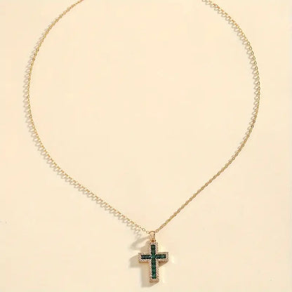 Solene Gold Necklace with Cross Pendant and Emerald