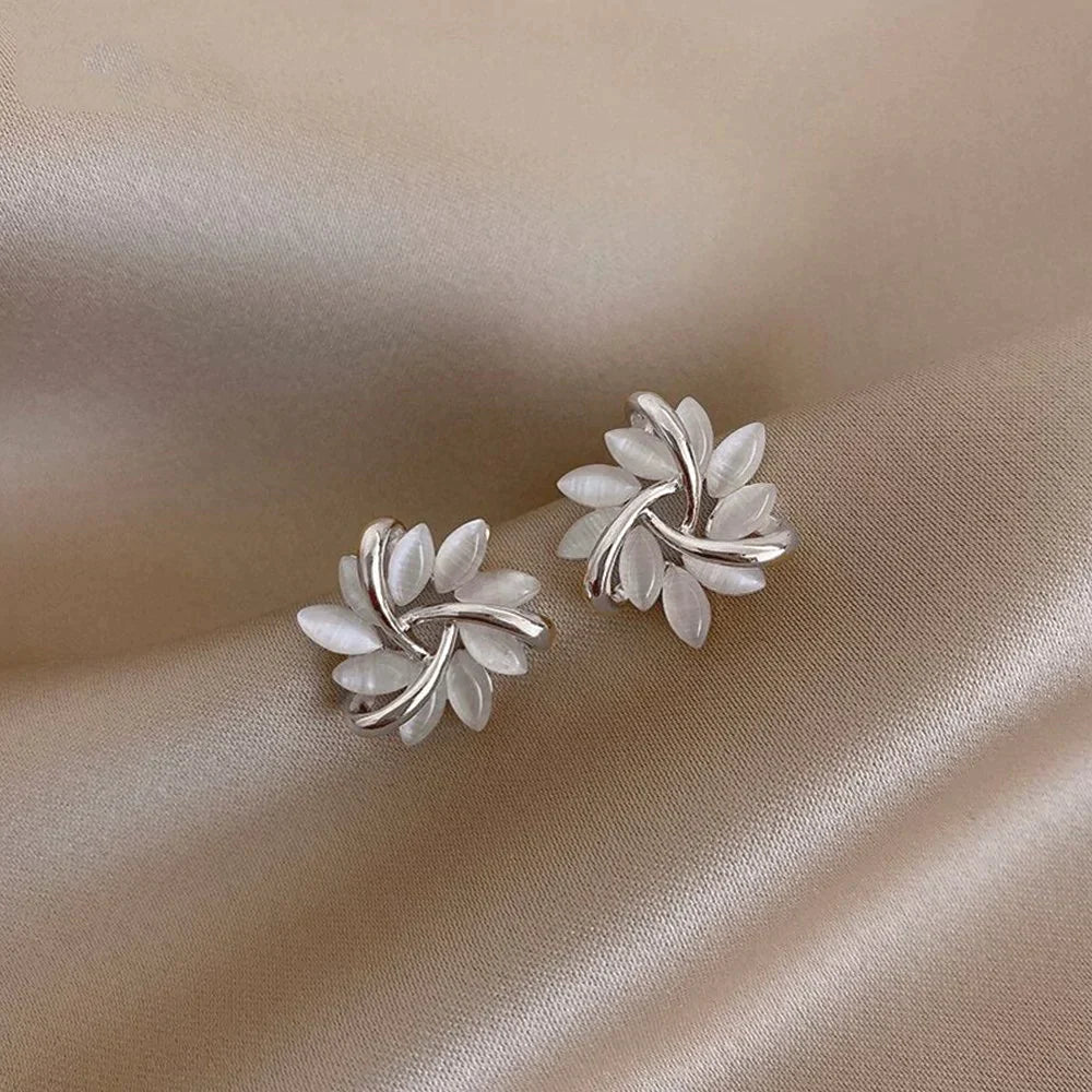 Circle earrings with gold opal petals