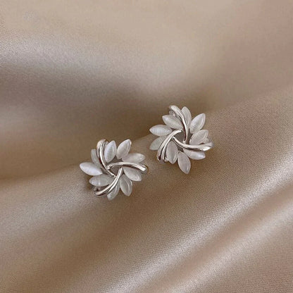 Circle earrings with gold opal petals
